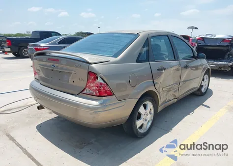 2004 Ford Focus Zts z USA, uszkodzony, nr VIN 1FAFP38Z84W183828